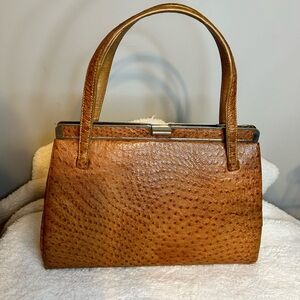 Vintage ostrich leather with kiss lock closure